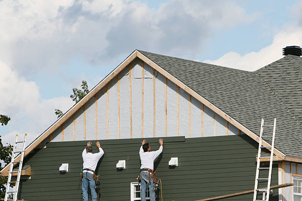 Professional Storm Damage Siding Repair technician working in Indian Trail, NC